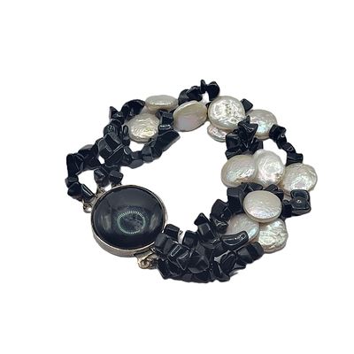 Multi-Strand Black Onyx & Coin Pearl Bracelet. Setting: Sterling Silver .925 
Main Gemstone: 