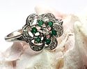 Emerald Cluster Ring with Diamond Swirl Halo. Setting: 10K White Gold 
Main Gemstone: Image - 2