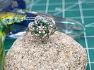 Emerald Cluster Ring with Diamond Swirl Halo. Setting: 10K White Gold 
Main Gemstone: Image - 7