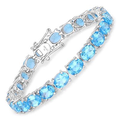 Fashionably Chunky Blue Topaz Eternity Bracelet. Setting: Sterling Silver .925 
Primary 