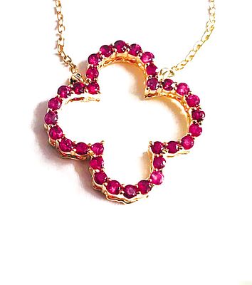 Open Design Ruby Quatrefoil Necklace. Setting: 14K Yellow Gold 
Primary Gemstone: Genuine Ruby 