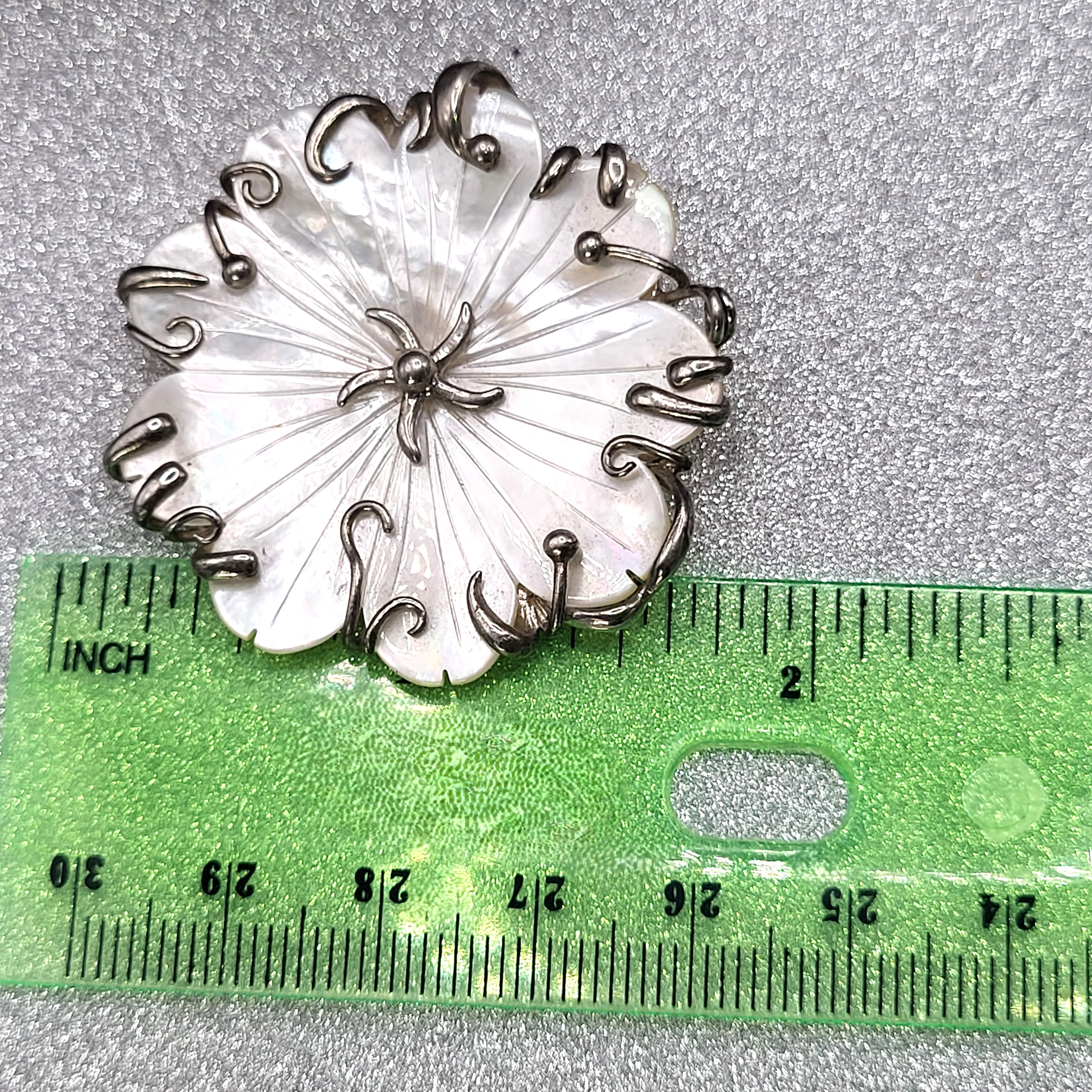 Carved Mother of Pearl Flower and Tendrils Pendant