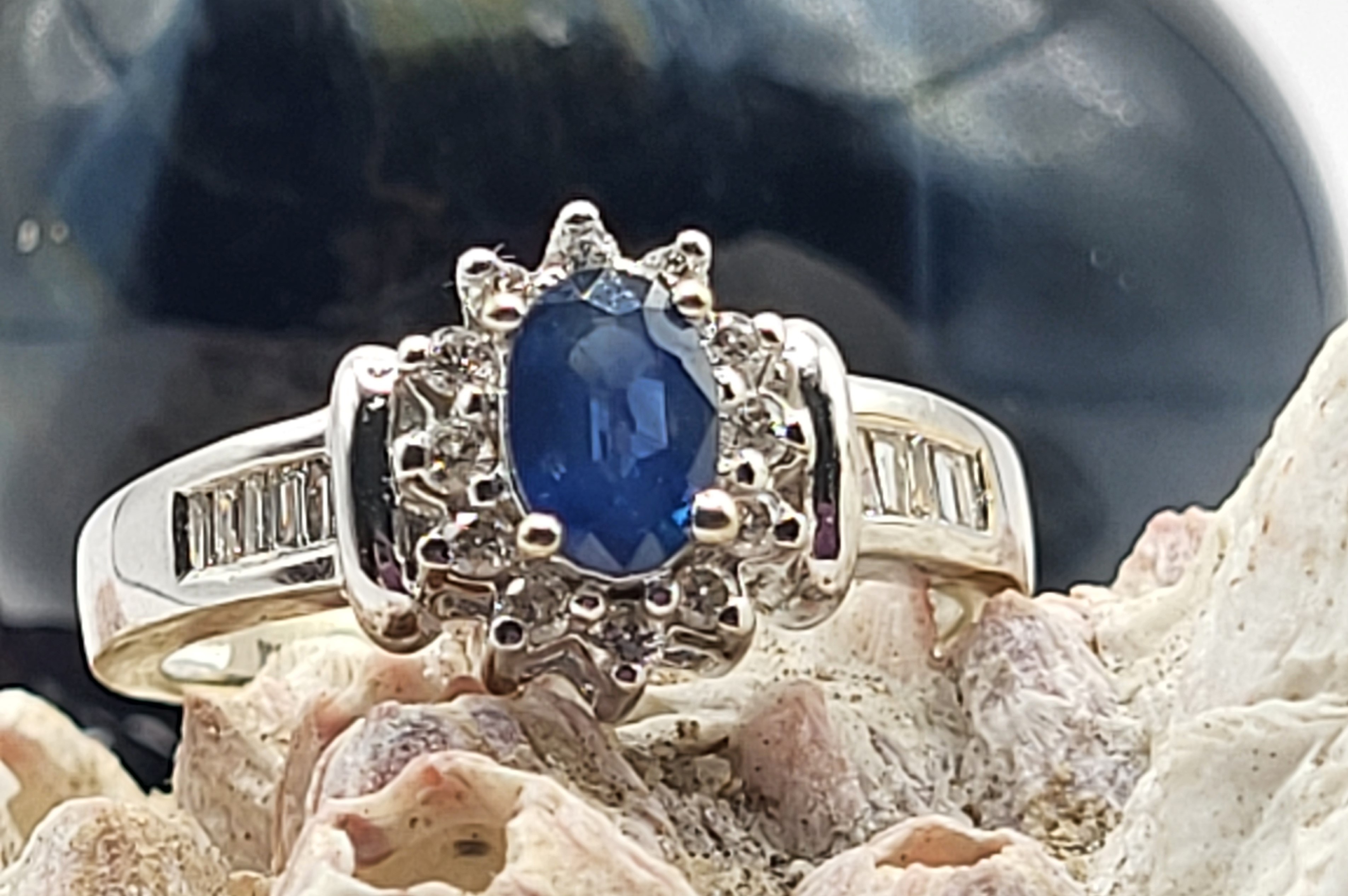 Oval Blue Sapphire and Diamond Halo Ring
