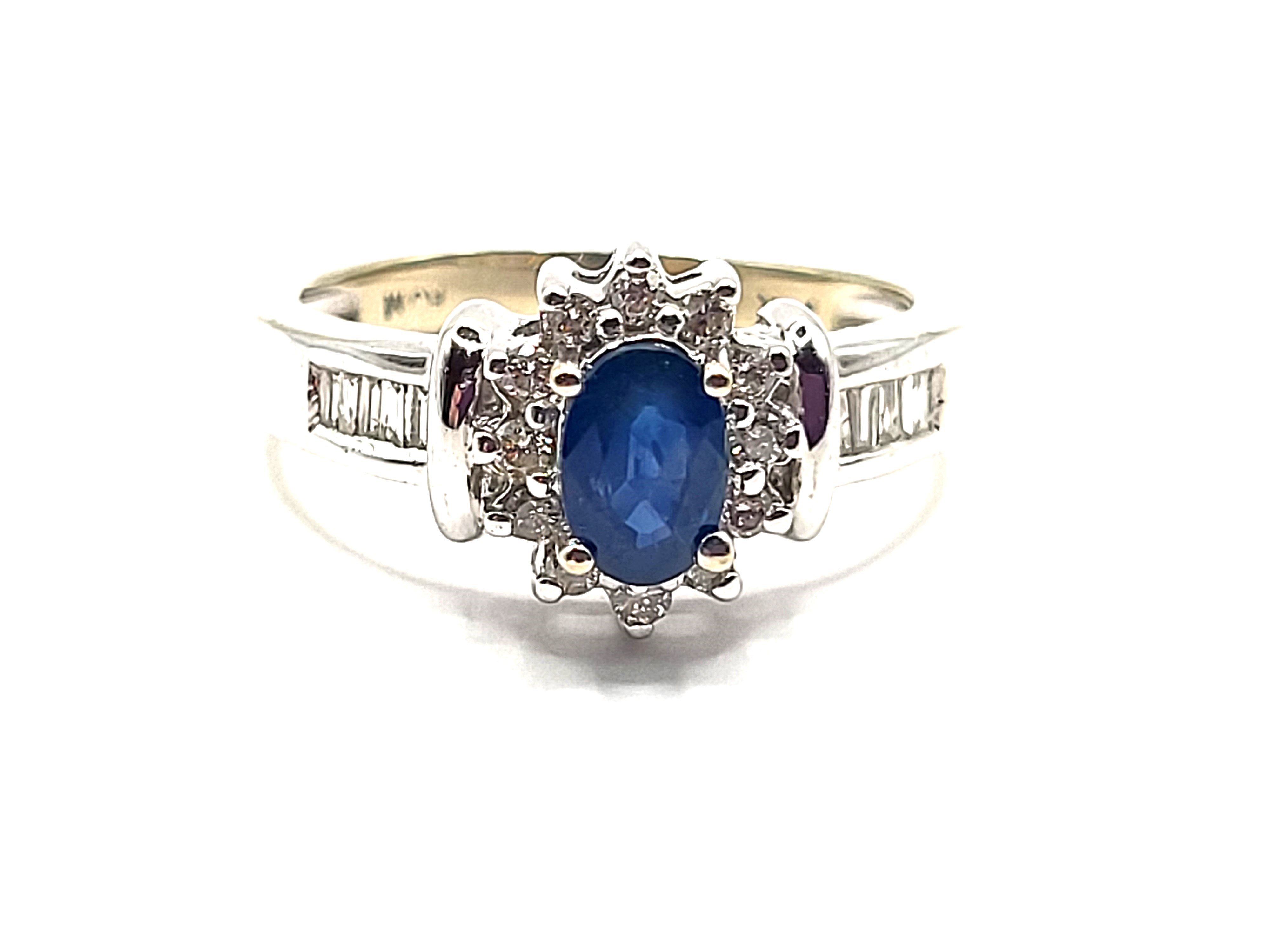 Oval Blue Sapphire and Diamond Halo Ring