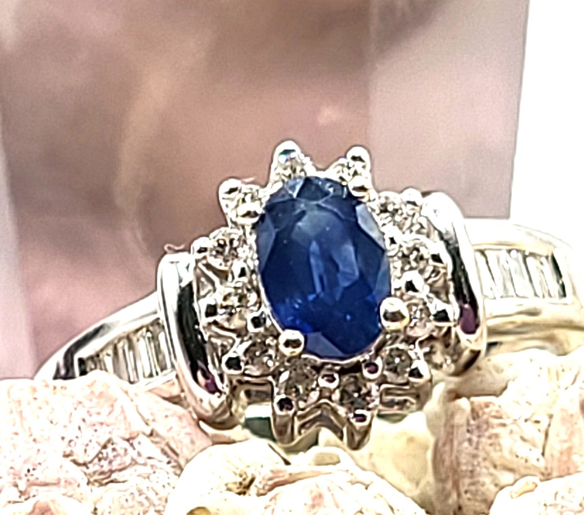 Oval Blue Sapphire and Diamond Halo Ring