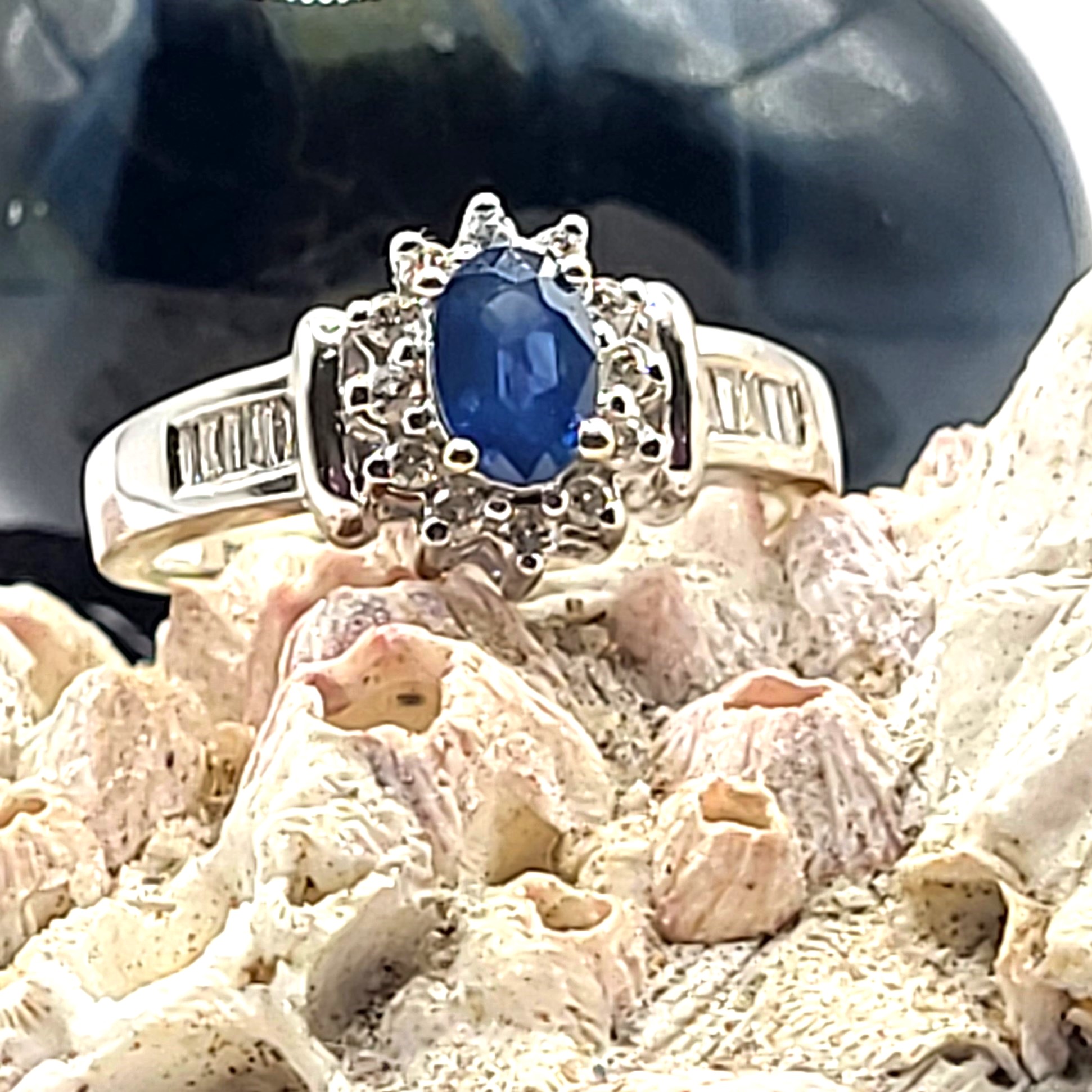 Oval Blue Sapphire and Diamond Halo Ring