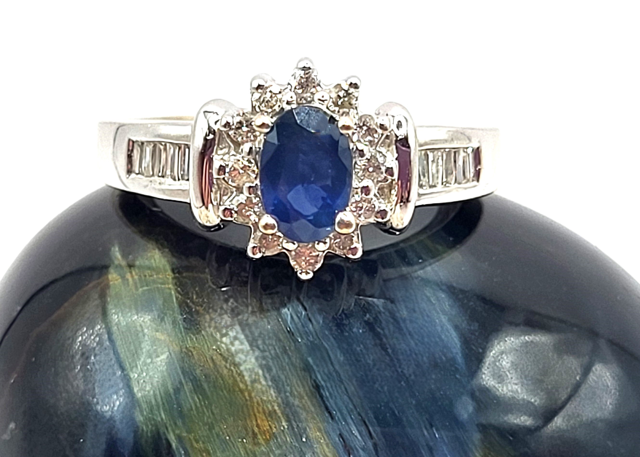 Oval Blue Sapphire and Diamond Halo Ring