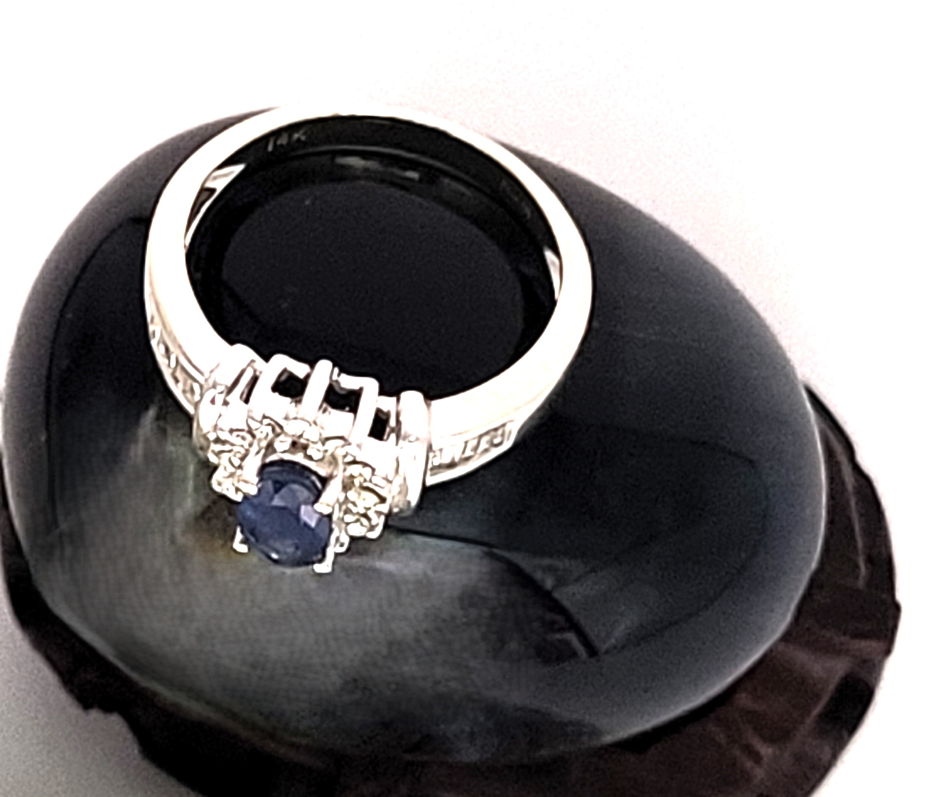 Oval Blue Sapphire and Diamond Halo Ring