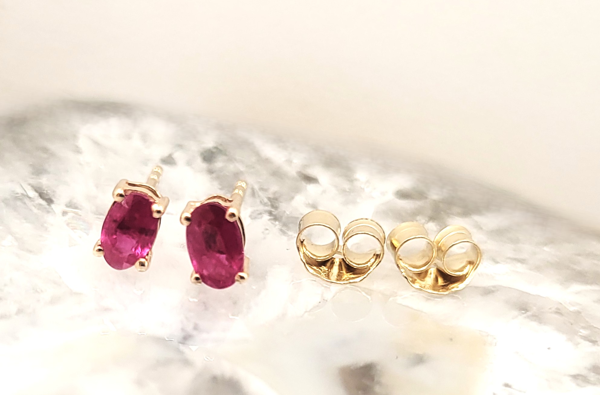 .75 CTW Genuine, Oval-Cut Ruby Solitaire Earrings 14K