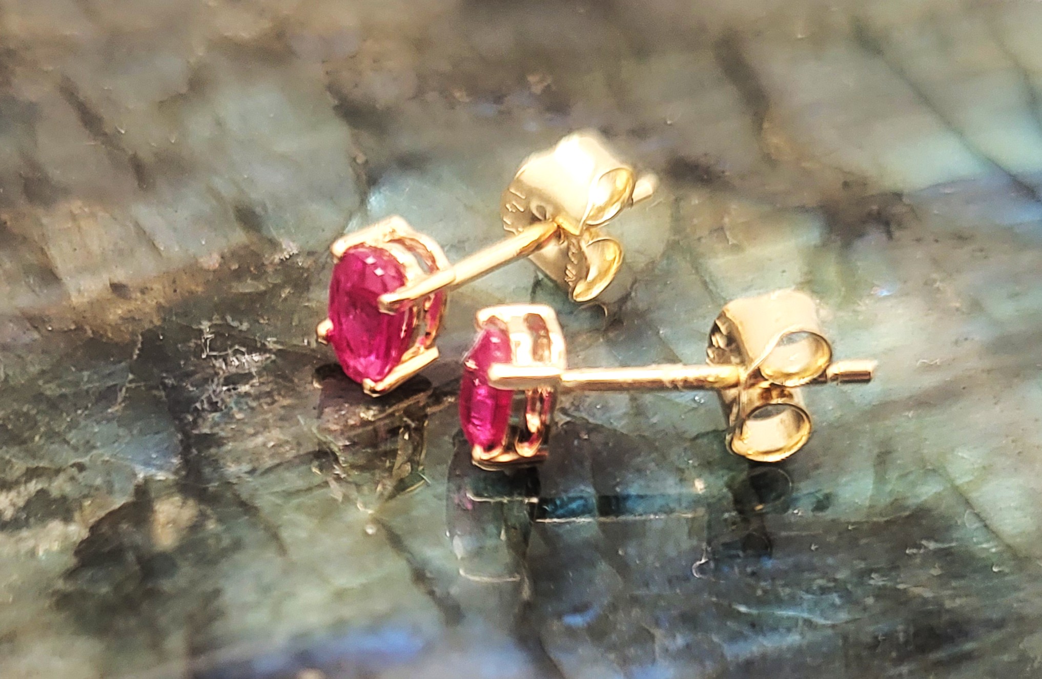 .75 CTW Genuine, Oval-Cut Ruby Solitaire Earrings 14K