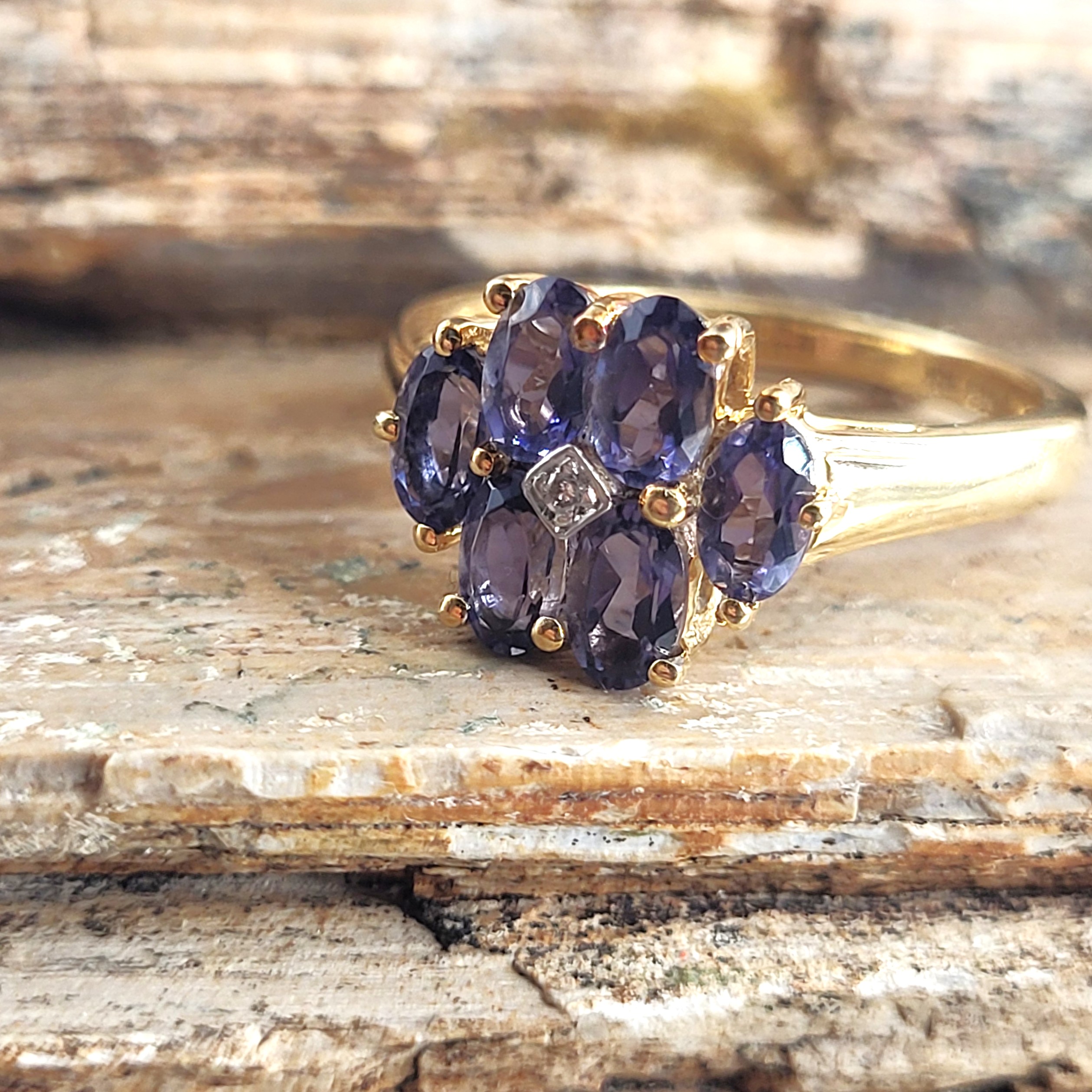Intriguing Iolite and Diamond Center Flower Ring