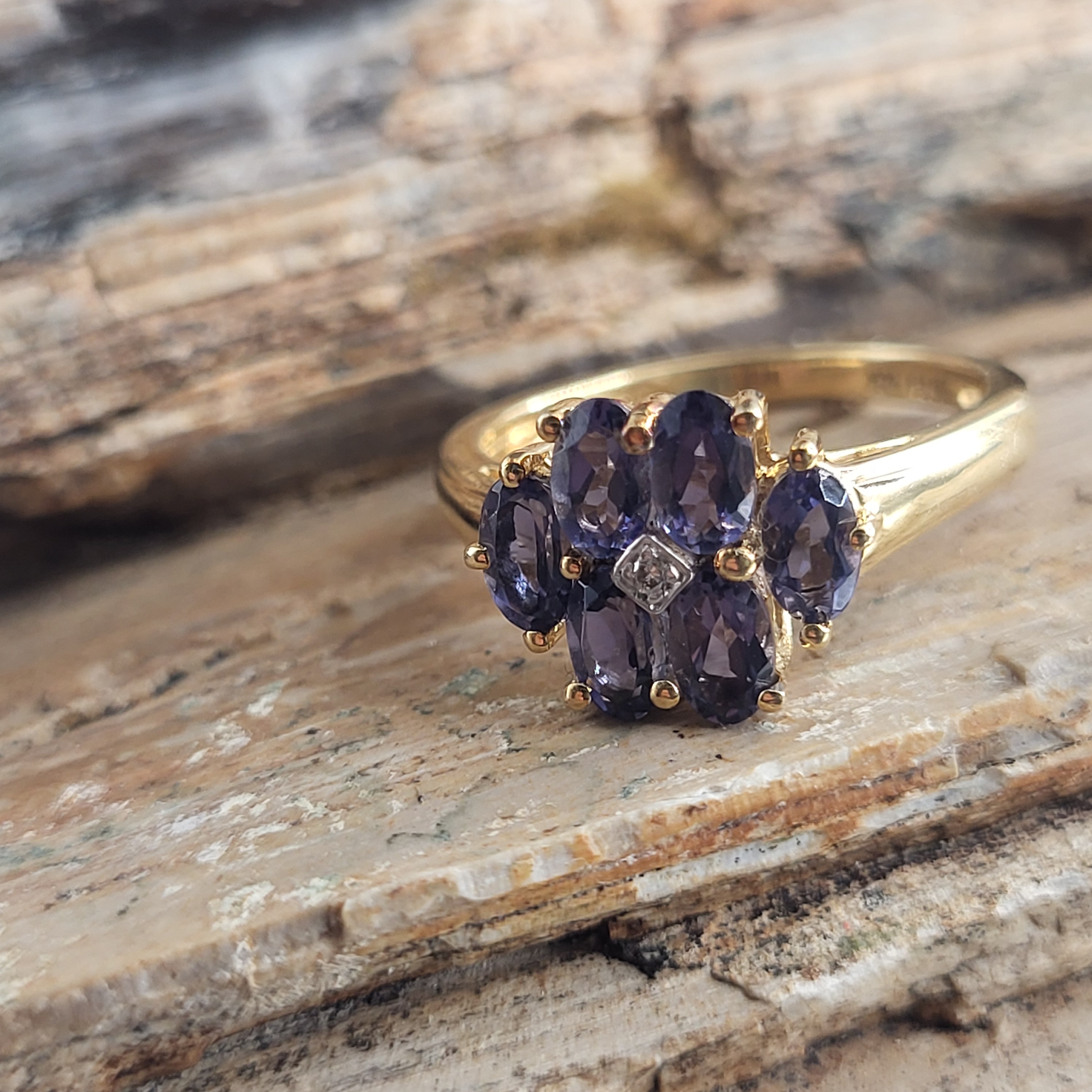 Intriguing Iolite and Diamond Center Flower Ring