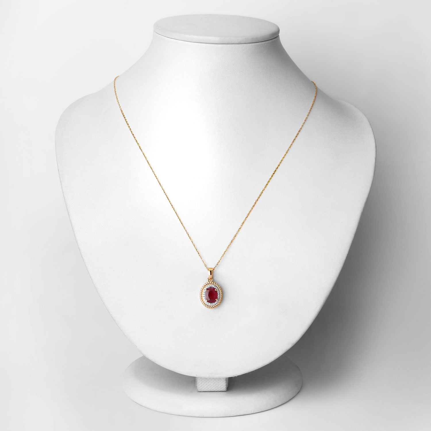 Oval-cut Ruby and Diamond Pendant with Braided Rope Frame