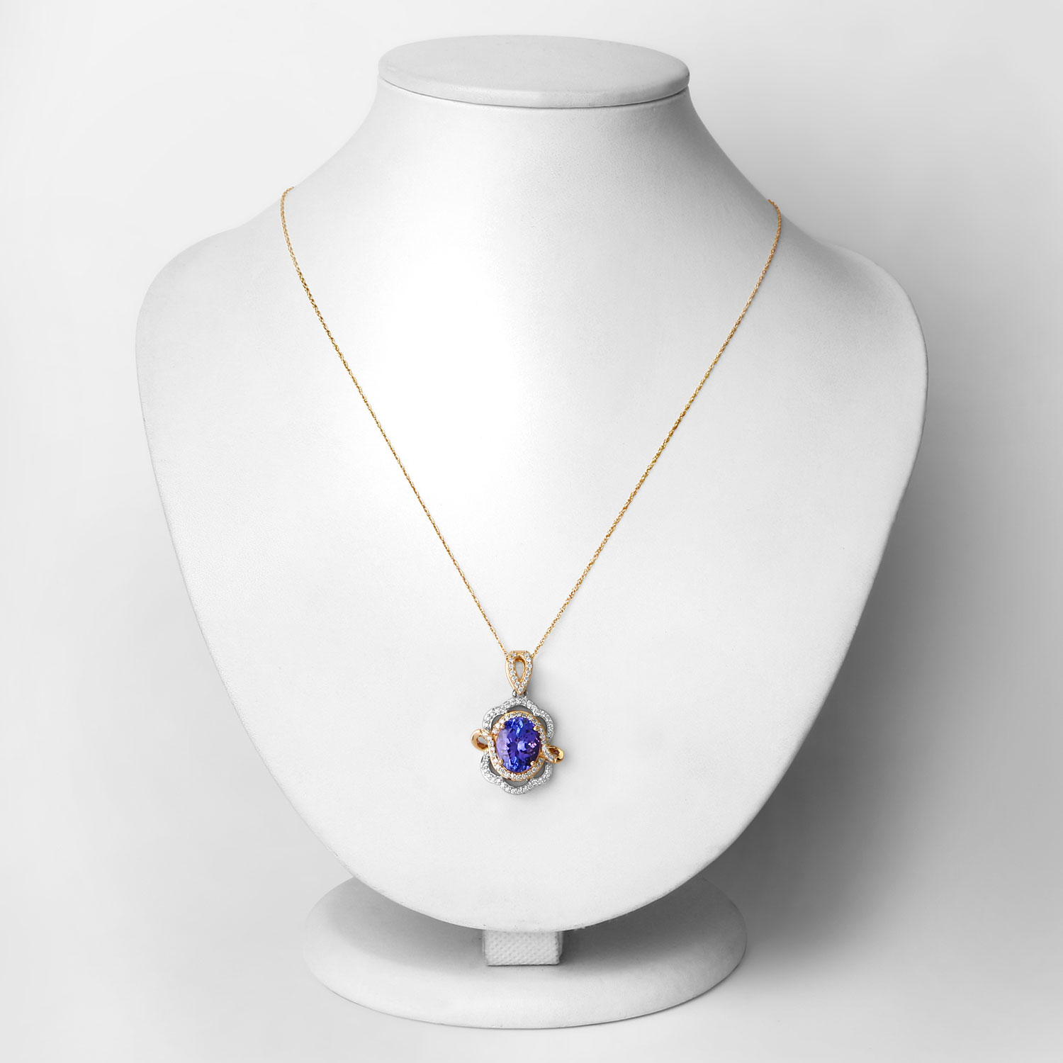 14KY&W Gold Tanzanite and Diamond Swirled Pendant