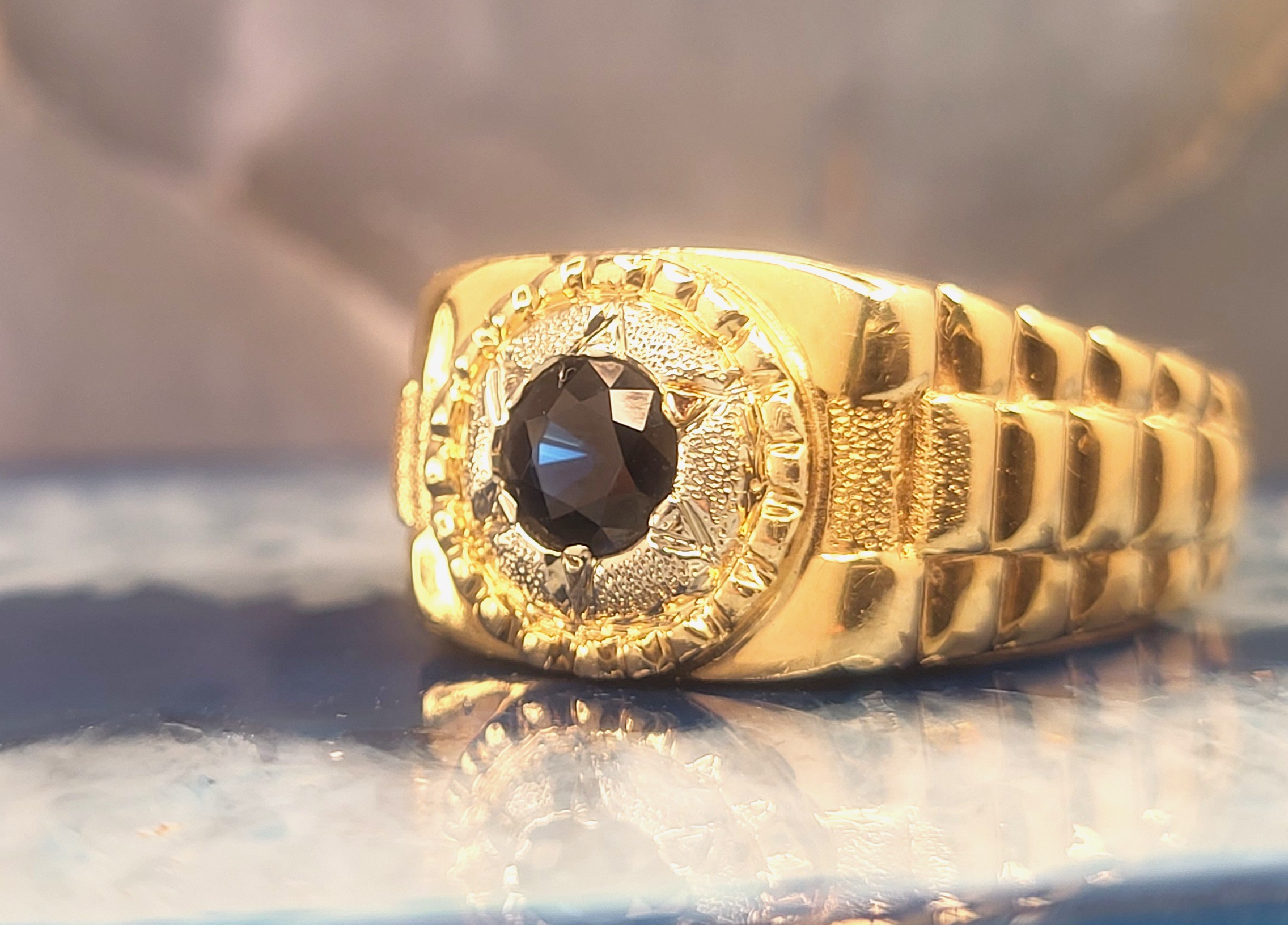 Man's Blue Sapphire Ring with Jubilee Shoulders