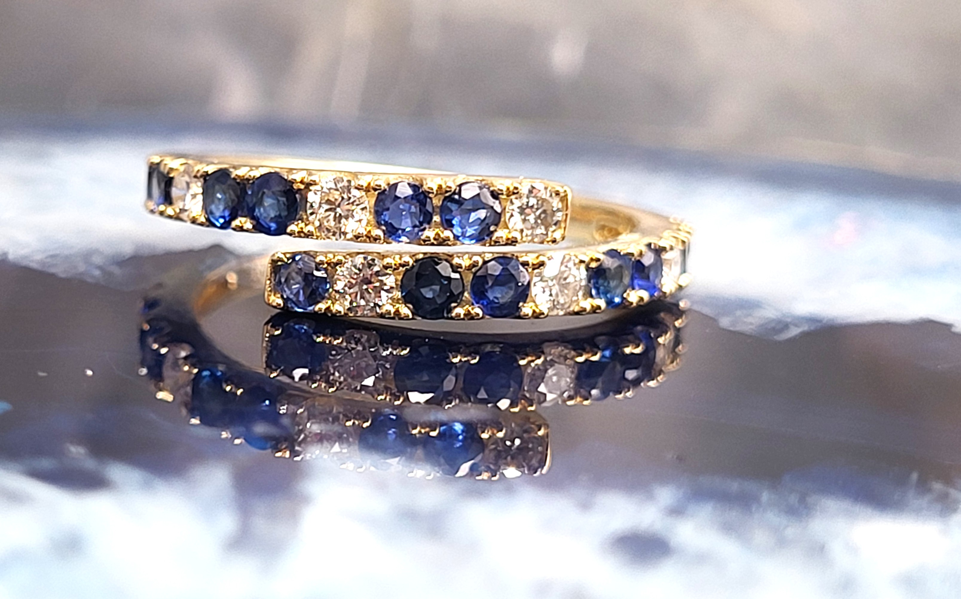 Breathtaking Blue Sapphire and Diamond Bypass Ring
