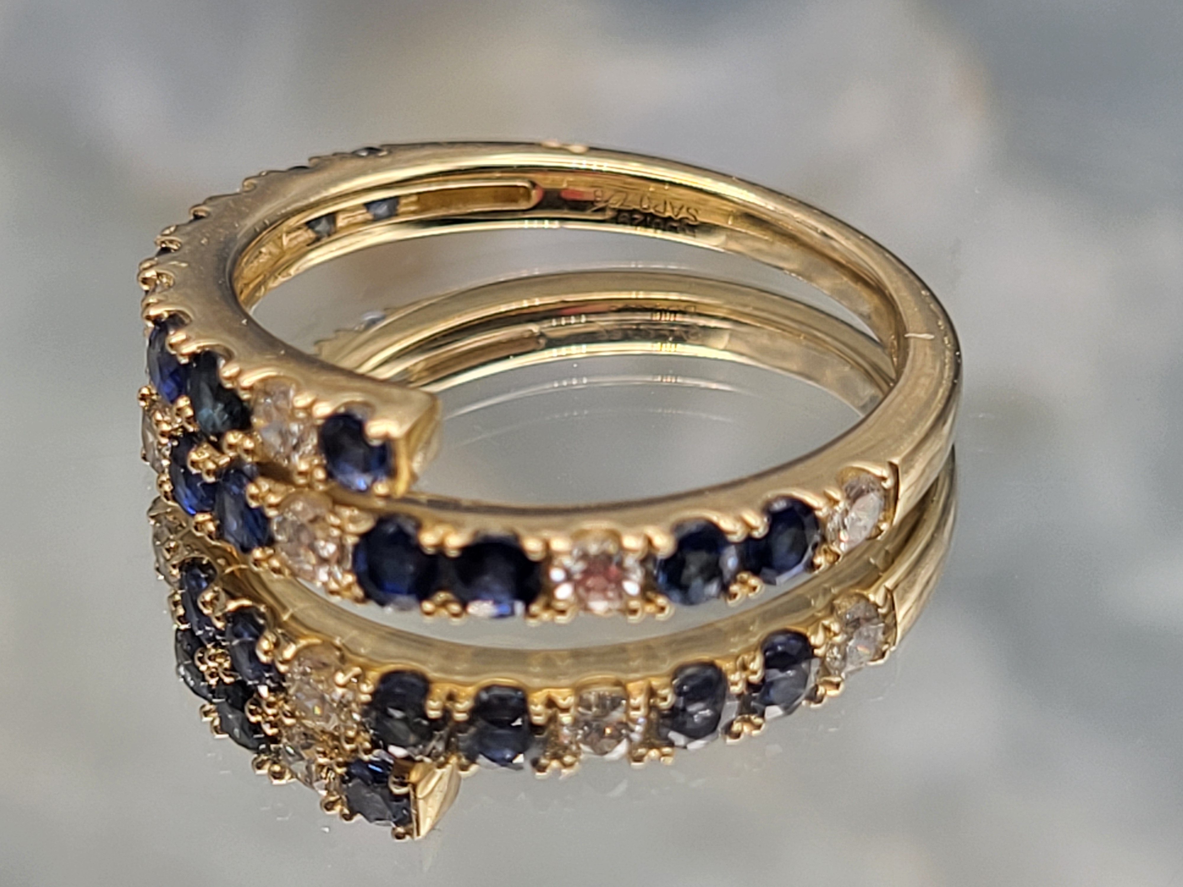 Breathtaking Blue Sapphire and Diamond Bypass Ring