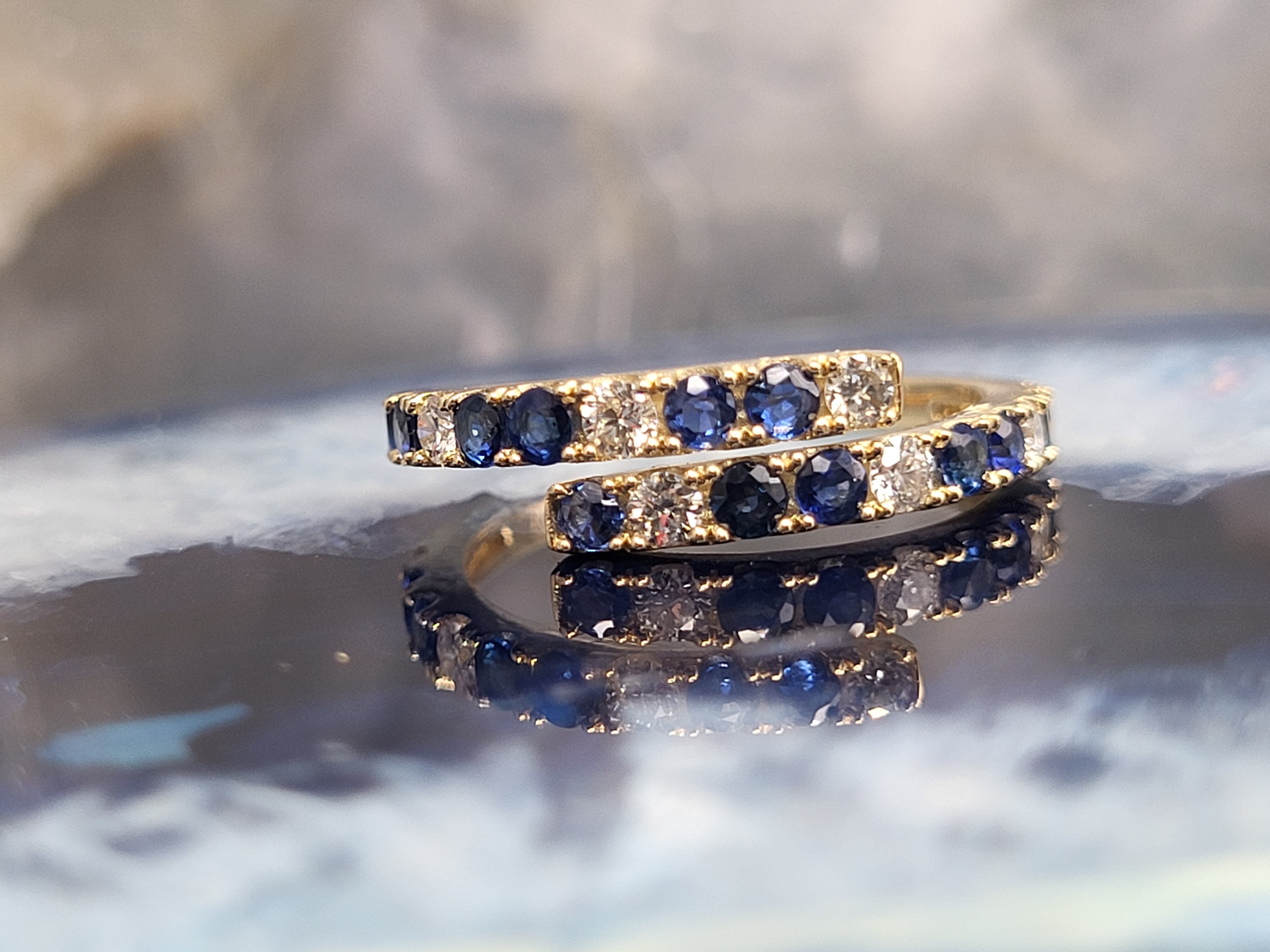 Breathtaking Blue Sapphire and Diamond Bypass Ring