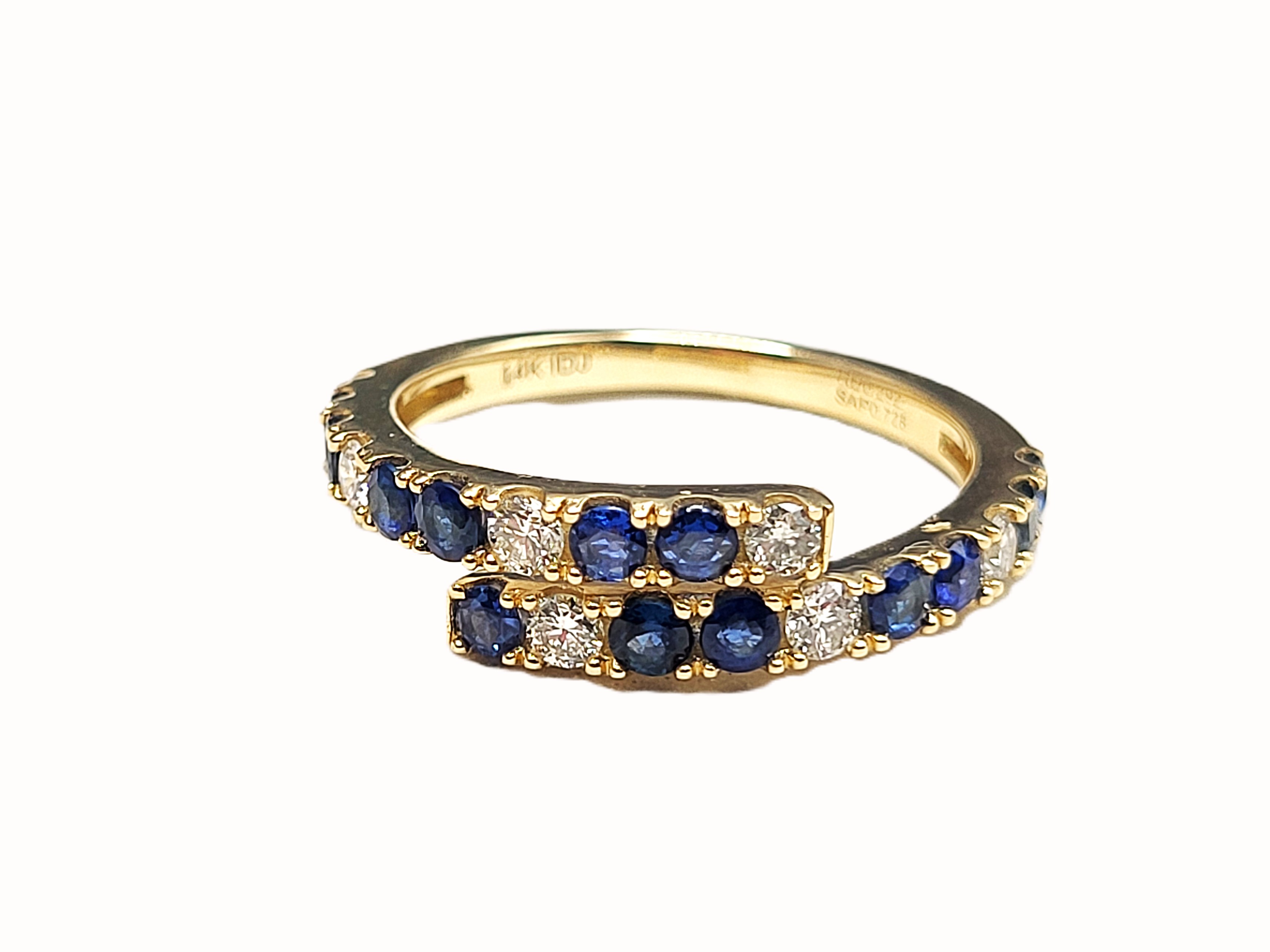 Breathtaking Blue Sapphire and Diamond Bypass Ring