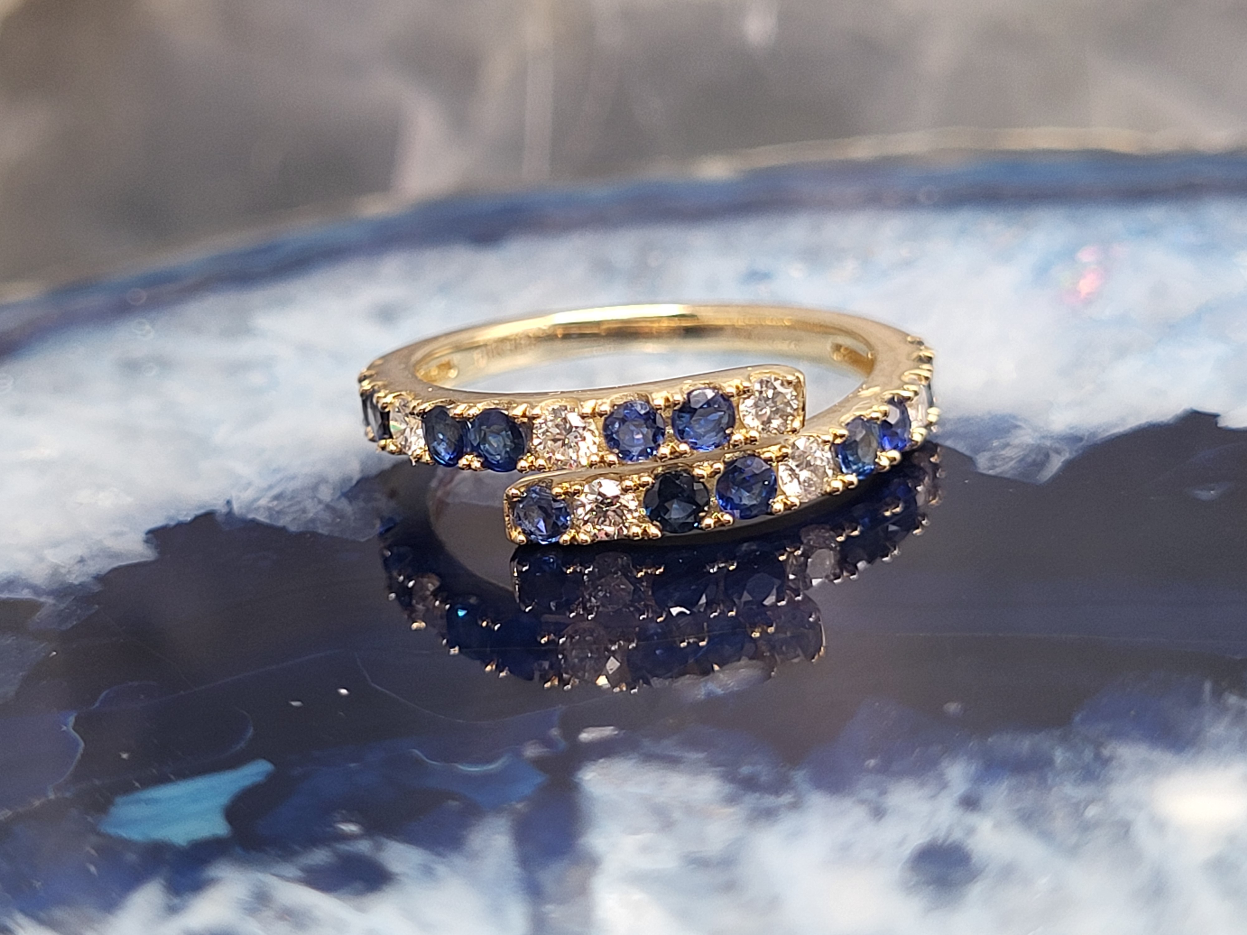 Breathtaking Blue Sapphire and Diamond Bypass Ring