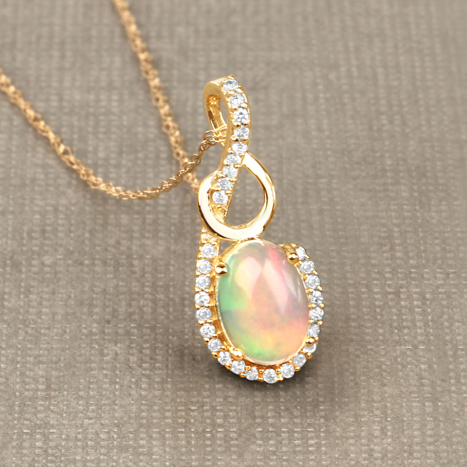 Ethiopian Opal and Swirled Diamond Pendant 14K