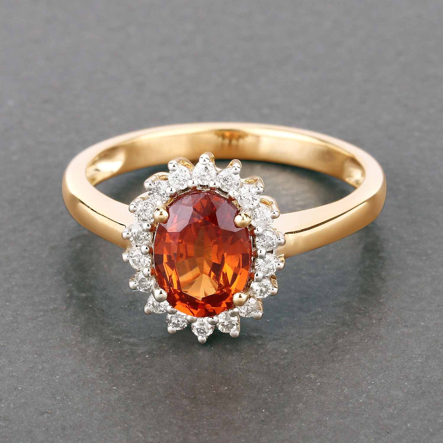 Spessartite Garnet and Diamond Halo Ring