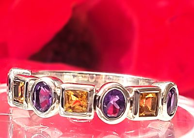 Chromia Sterling Silver Amethyst and Citrine Asymmetic 1.00 CTW Ring. 31100154 
Setting: 