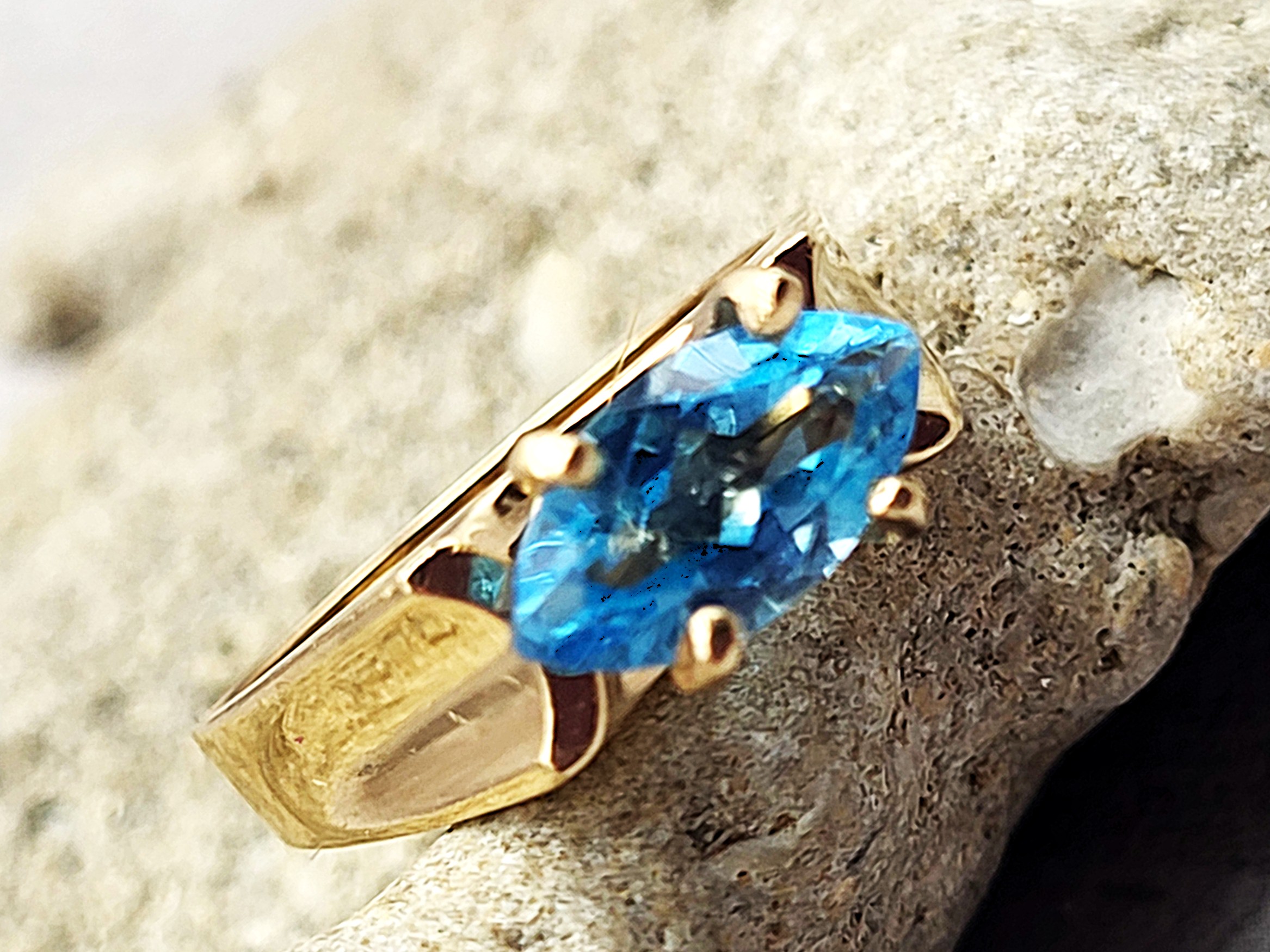 East-West Marquise Blue Topaz Saddle Ring