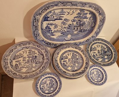 Selection Of Blue And White Antique Plates . Matching pattern to include charger