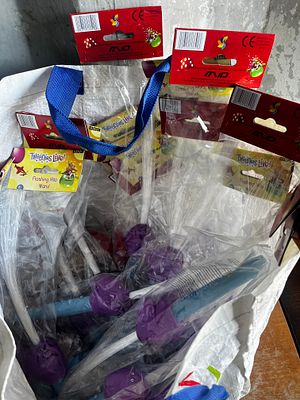 Job lot of tweenie light up wands in bag. Over 20