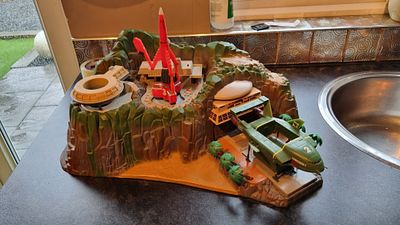 Tracy island plus 
Thunderbird 2 and three . Large edition of Tracy 
Island play set plus two 
