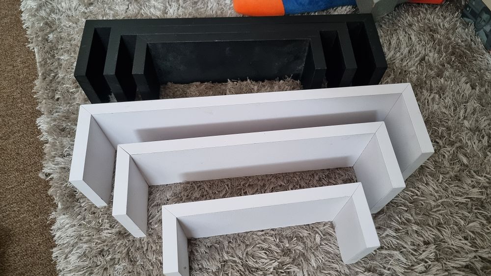 Two sets of shelves . Two sets of small shelves