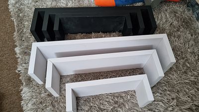 Two sets of shelves . Two sets of small shelves