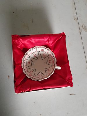 Fortune Tellers Cup & Saucer. A contemporary tasseography or tea leaf reading set designed by 