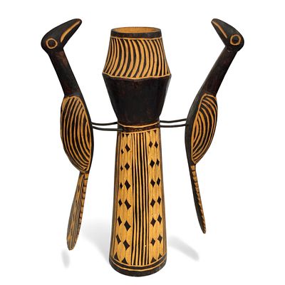 AFRICAN HANDICRAFTS. Candlestick carved in wood flanked by birds. Dim: 36 cm.