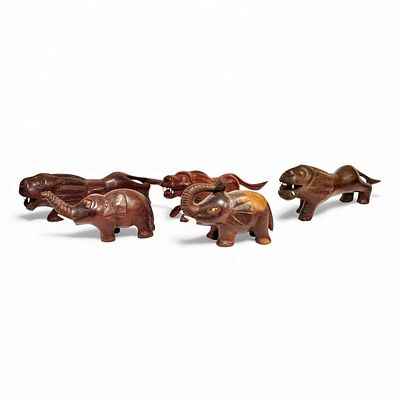 AFRICAN CRAFTS. Set composed of 5 animals carved in wood. Dim: 32 cm (largest).