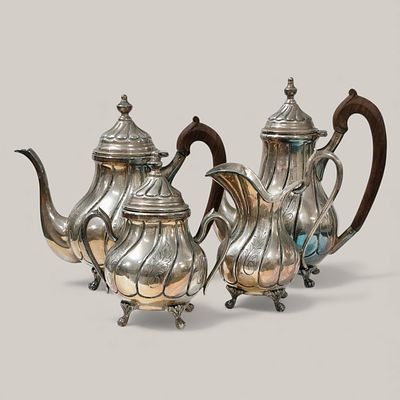 SILVER-PLATED SERVICE. COFFEEPOT, TEAPOT, SUGAR BOWL AND CREAMER IN SILVER-PLATED BRONZE - solid 