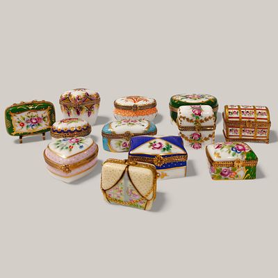 EUROPEAN PORCELAIN. SET OF TWELVE SMALL EUROPEAN PORCELAIN BOXES - with hand-finished 