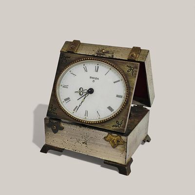 SWIZA TABLE CLOCK - Model 8, with phosphorescent hands, in a brass and iron case shaped like an 