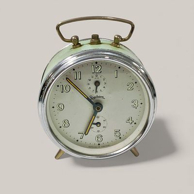 REGULADORA ALARM CLOCK - national, from the mid-20th century, with fluorescent numbers, chromed 