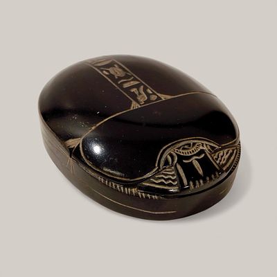 BASALT EGYPTIAN SCARAB PAPERWEIGHT - 20th century, with hieroglyphs carved on the back and 