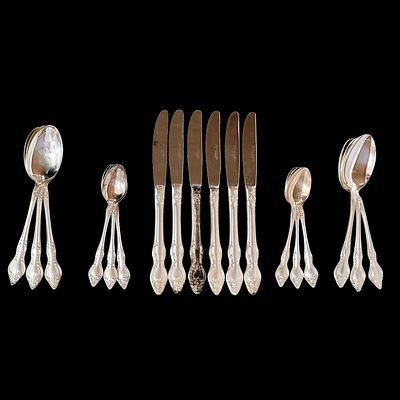 STAINLESS STEEL. Set of 18 stainless steel cutlery pieces, 12 spoons and 6 knives, different 