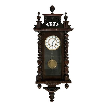 WALL CLOCK. Antique clock with winding mechanism and chime, no visible brand, decorated with 