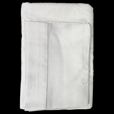 LINEN AND COTTON. Set of embroidered cotton top sheet and linen pillowcase with initials JJ. 