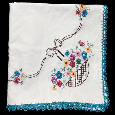 COTTON. Embroidered and laced cotton tablecloth in yellow tone, colorful floral motifs. Dim: 