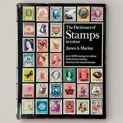 STAMPS. “The Dictionary of Stamps in Colour” by James A. Mackay, approximately 3,000 color 