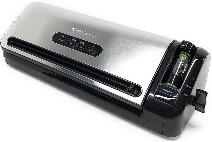 FOODSAVER 2-IN-1 VACUUM SEALING SYSTEM. FoodSaver 2-in-1 food preservation system combining a 