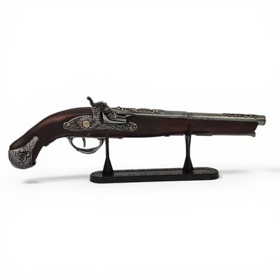 SWORDFISH TABLE LIGHTER. Swordfish, gun-shaped lighter with a stand. Dimensions: 44cm length.