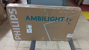 PHILIPS 50" 4K UHD AMBILIGHT SMART TV. 50-inch television sold for repair or parts, potentially Image - 1