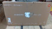 XIAOMI 65" MINI LED 4K UHD SMART TV (GOOGLE TV). 65-inch television sold for repair or parts Image - 1